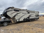 Call now about this 2015 Grand Design Momentum 380TH! 2015 Grand Design Momentum 380TH - Used Toy Hauler For Sale by Pop RVs in Twin Bridges, Montana features Air Conditioning, Awning, Leveling Jacks, Generator, Slideout