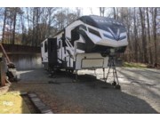 Call now about this 2021 Dutchmen Voltage 4195! 2021 Dutchmen Voltage 4195 - Used Toy Hauler For Sale by Pop RVs in Canton, Georgia features Air Conditioning, Leveling Jacks, Awning, Generator, Slideout