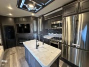 Call now about this 2022 DRV Full House LX455! 2022 DRV Full House LX455 - Used Toy Hauler For Sale by Pop RVs in Parrish, Florida features Air Conditioning, Generator, Slideout, Awning