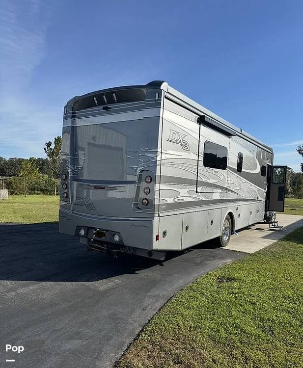 Call now about this 2023 Dynamax Corp DX3 37RB! 2023 Dynamax Corp DX3 37RB - Used Class C For Sale by Pop RVs in Plant City, Florida features Slideout
