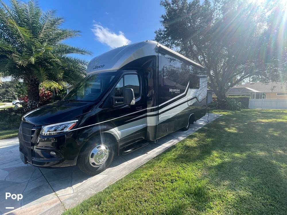 Call now about this 2022 Jayco Melbourne 24RP Prestige! 2022 Jayco Melbourne 24RP Prestige - Used Class C For Sale by Pop RVs in Venice, Florida features Generator, Awning, Leveling Jacks, Air Conditioning, Slideout