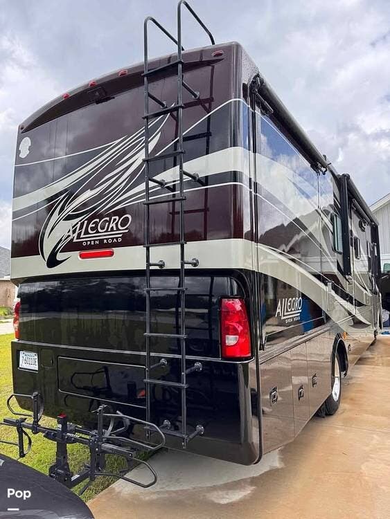 Call now about this 2012 Tiffin Allegro Open Road 34TGA! 2012 Tiffin Allegro Open Road 34TGA - Used Class A For Sale by Pop RVs in Milton, Florida features Air Conditioning, Leveling Jacks, Awning, Slideout, Generator