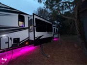 Call now about this 2024 Grand Design Momentum 399TH! 2024 Grand Design Momentum 399TH - Used Toy Hauler For Sale by Pop RVs in La Grange, Texas features Slideout
