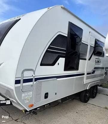 Call now about this 2023 Lance Lance 1995! 2023 Lance Lance 1995 - Used Travel Trailer For Sale by Pop RVs in Morgan Hill, California features Leveling Jacks, Slideout, Air Conditioning, Awning