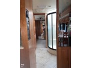 Call now about this 2009 Monaco RV Camelot 42PDQ! 2009 Monaco RV Camelot 42PDQ - Used Diesel Pusher For Sale by Pop RVs in Lake Panasoffkee, Florida features Generator, Air Conditioning, Slideout