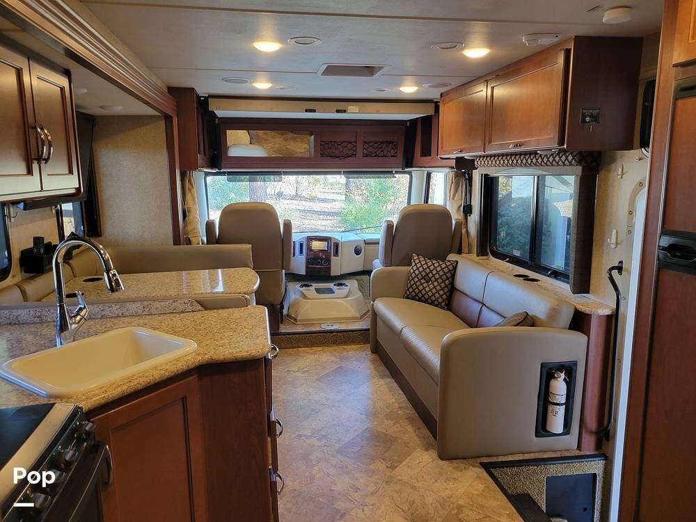 Call now about this 2016 Thor Motor Coach A.C.E. 30.2! 2016 Thor Motor Coach A.C.E. 30.2 - Used Class A For Sale by Pop RVs in Paradise, California features Awning, Slideout, Leveling Jacks, Generator, Air Conditioning