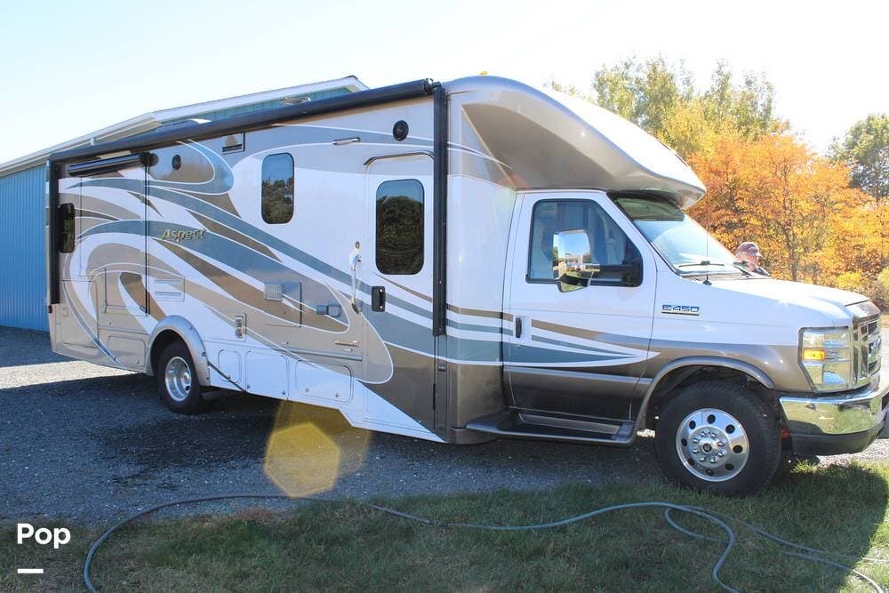 Call now about this 2016 Winnebago Aspect 27K! 2016 Winnebago Aspect 27K - Used Class C For Sale by Pop RVs in Mears, Michigan features Leveling Jacks, Slideout, Air Conditioning, Generator, Awning