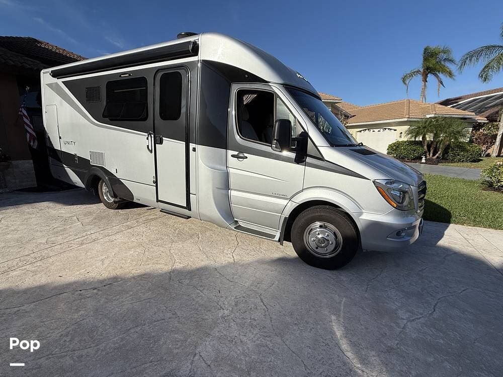Call now about this 2016 Leisure Travel Unity U24MB! 2016 Leisure Travel Unity U24MB - Used Class C For Sale by Pop RVs in Naples, Florida features Slideout, Awning, Generator, Air Conditioning