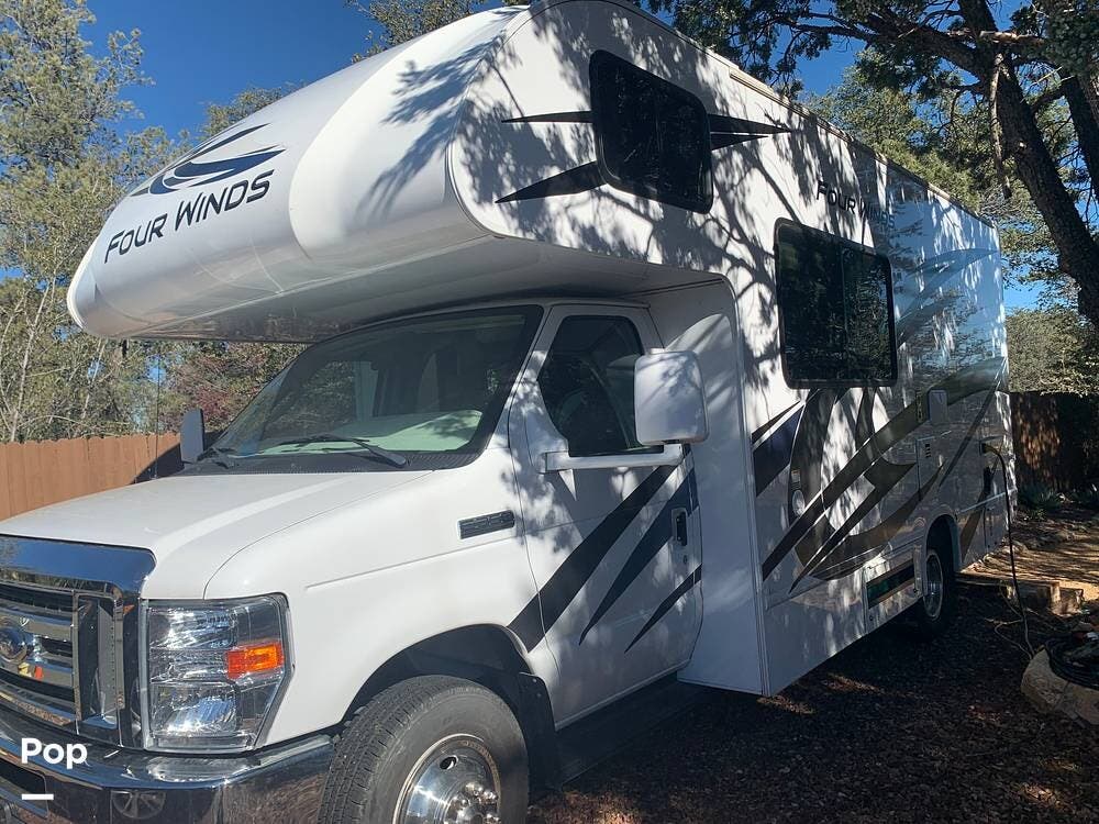 Call now about this 2023 Thor Motor Coach Four Winds 22E! 2023 Thor Motor Coach Four Winds 22E - Used Class C For Sale by Pop RVs in Prescott, Arizona features Generator, Awning, Air Conditioning