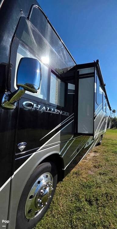 Call now about this 2023 Thor Motor Coach Challenger 36FA! 2023 Thor Motor Coach Challenger 36FA - Used Class A For Sale by Pop RVs in Okeechobee, Florida features Slideout