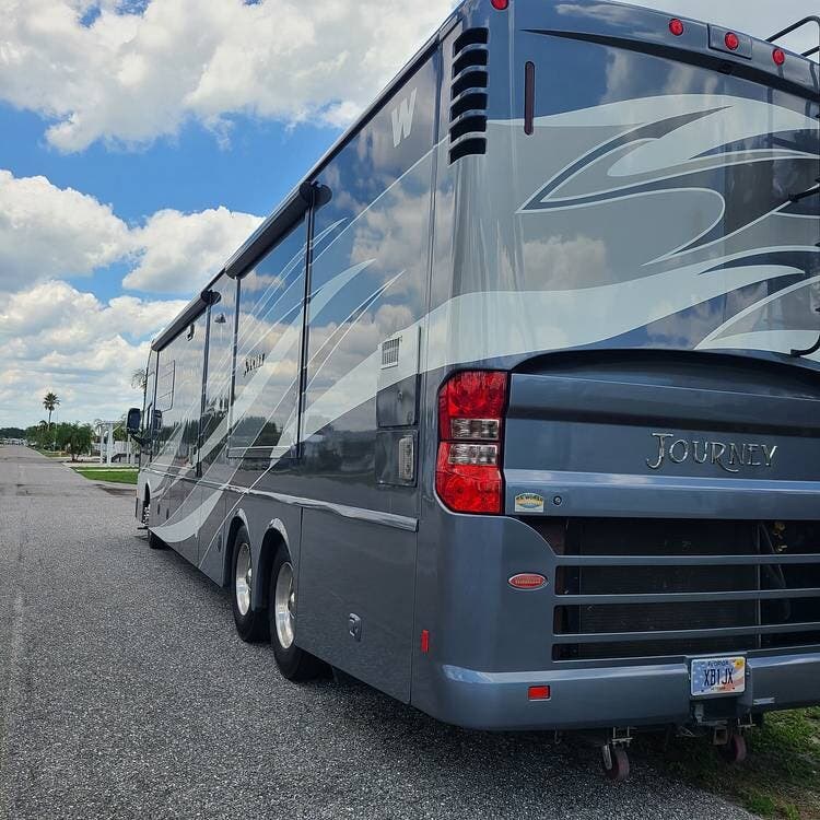 Contact us now about this 2014 Winnebago Journey 42E! 2014 Journey 42E by Winnebago from Pop RVs in Placida, Florida