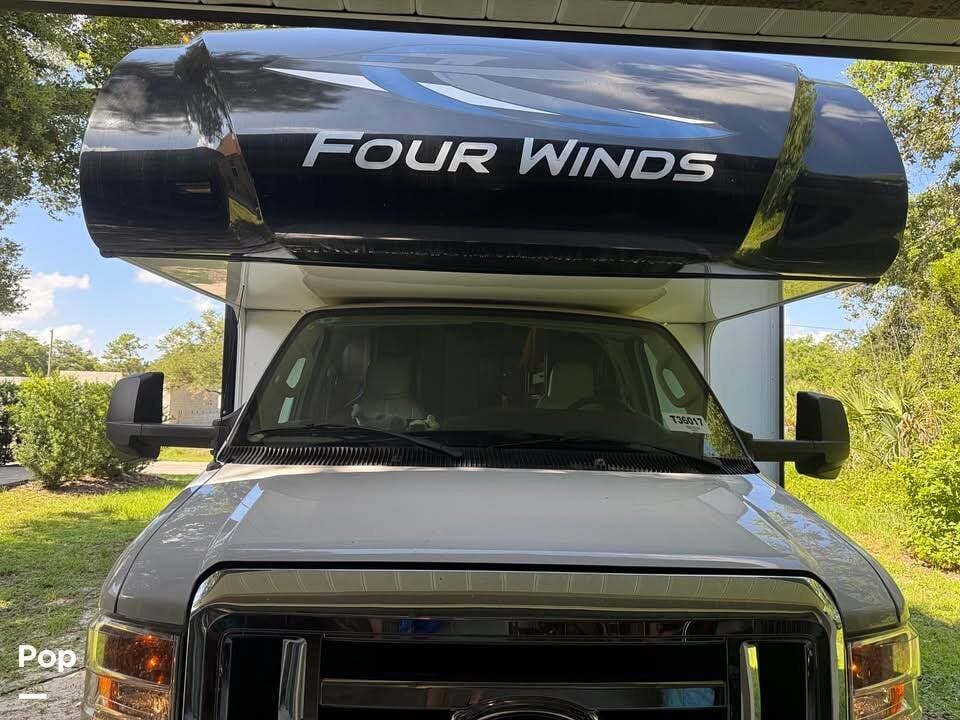 Call now about this 2023 Thor Motor Coach Four Winds 31E! 2023 Thor Motor Coach Four Winds 31E - Used Class C For Sale by Pop RVs in North Port, Florida features Slideout