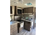 Call now about this 2022 Grand Design Imagine XLS 22 RBE! 2022 Grand Design Imagine XLS 22 RBE - Used Travel Trailer For Sale by Pop RVs in Ocala, Florida features Slideout, Leveling Jacks, Air Conditioning, Awning