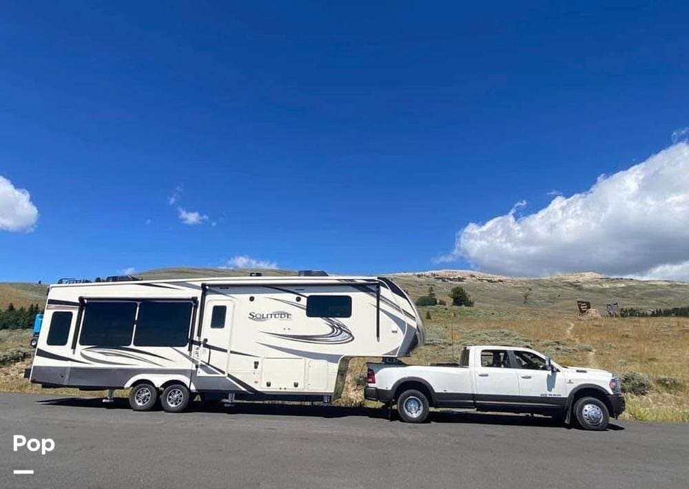 Call now about this 2021 Grand Design Solitude 310GK! 2021 Grand Design Solitude 310GK - Used Fifth Wheel For Sale by Pop RVs in Blue Springs, Missouri features Slideout