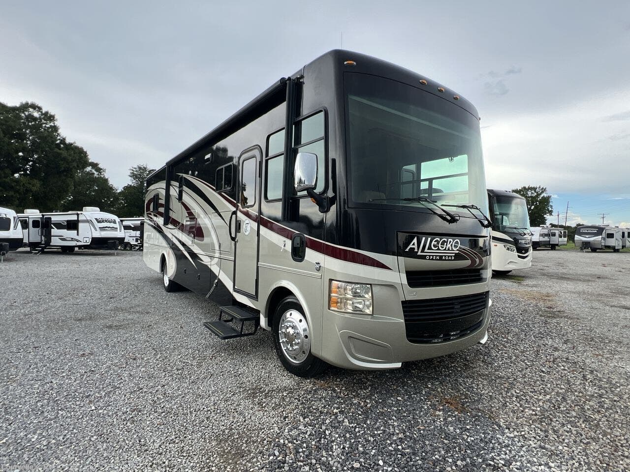 Call now about this 2015 Tiffin Open Road Allegro 36LA! 2015 Tiffin Open Road Allegro 36LA - Used Class A For Sale by Courvelle's RV in Opelousas, Louisiana features Side View Cameras, Refrigerator, TV, Power Awning, Water Heater
