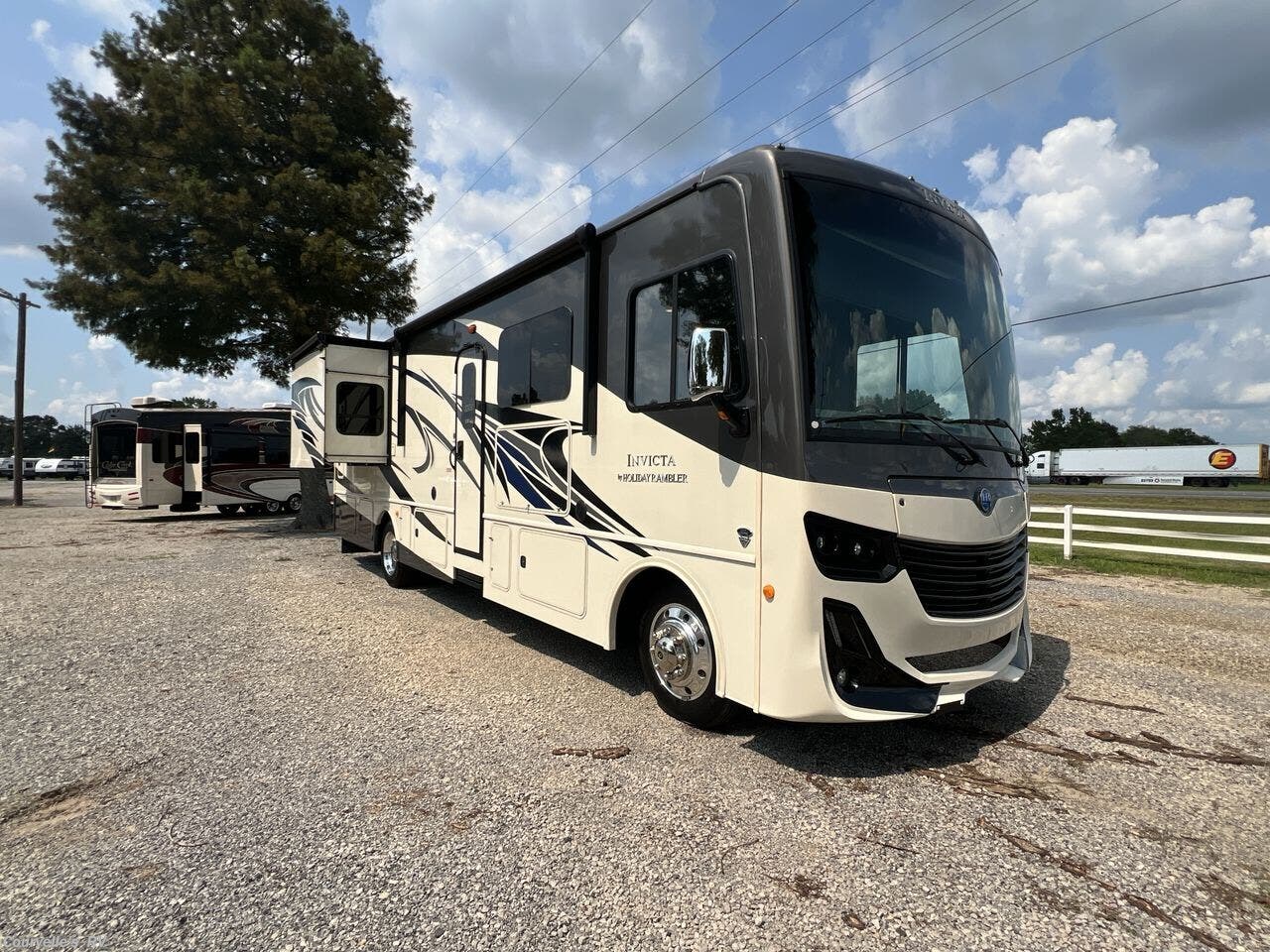 Call now about this 2022 Holiday Rambler Invicta 32RW! 2022 Holiday Rambler Invicta 32RW - Used Class A For Sale by Courvelle's RV in Opelousas, Louisiana features CO Detector, Outside Entertainment Center, Stove Top Burner, Auxiliary Battery, Theater Seating