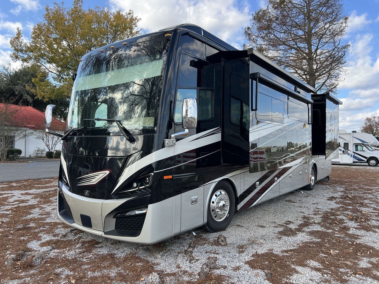 Call now about this 2022 Tiffin Phaeton 40IH! 2022 Tiffin Phaeton 40IH - Used Diesel Pusher For Sale by Courvelle's RV in Opelousas, Louisiana features Ladder, Power Roof Vent, Auxiliary Battery, Side View Cameras, Roof Vents