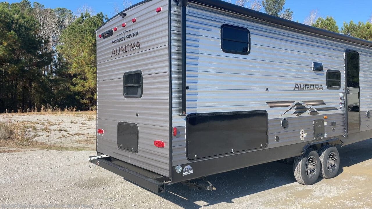 Contact us now about this 2026 Forest River Aurora 29TQS! 2026 Aurora 29TQS by Forest River from Blue Compass RV North Myrtle Beach in Longs, South Carolina