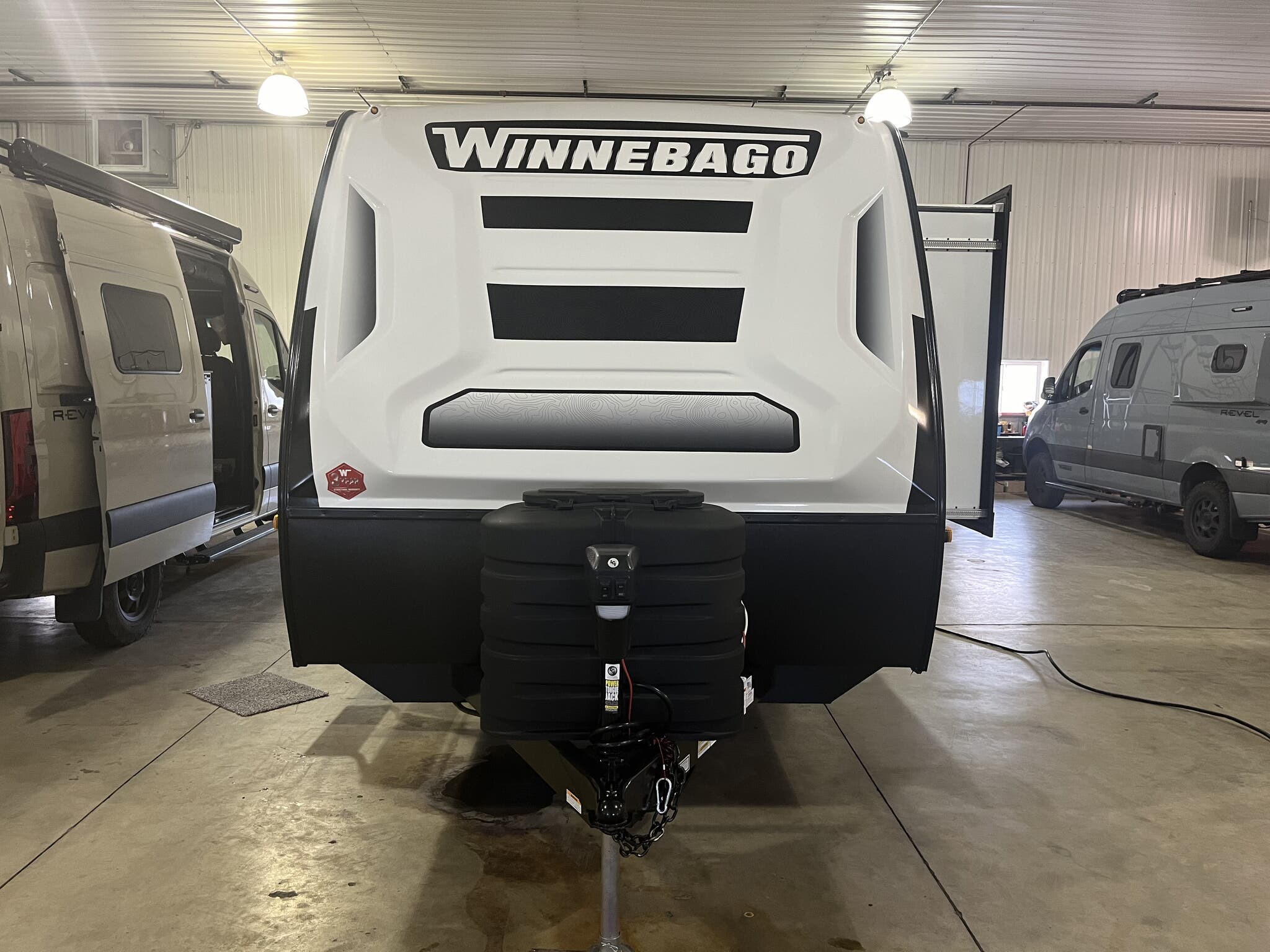 Call now about this 2024 Winnebago Micro Minnie 2100BH! 2024 Winnebago Micro Minnie 2100BH - New Travel Trailer For Sale by Winnebago Motor Homes in Rockford, Illinois features Booth Dinette, Battery Charger, Luggage Rack, Bunk Beds, Slideout