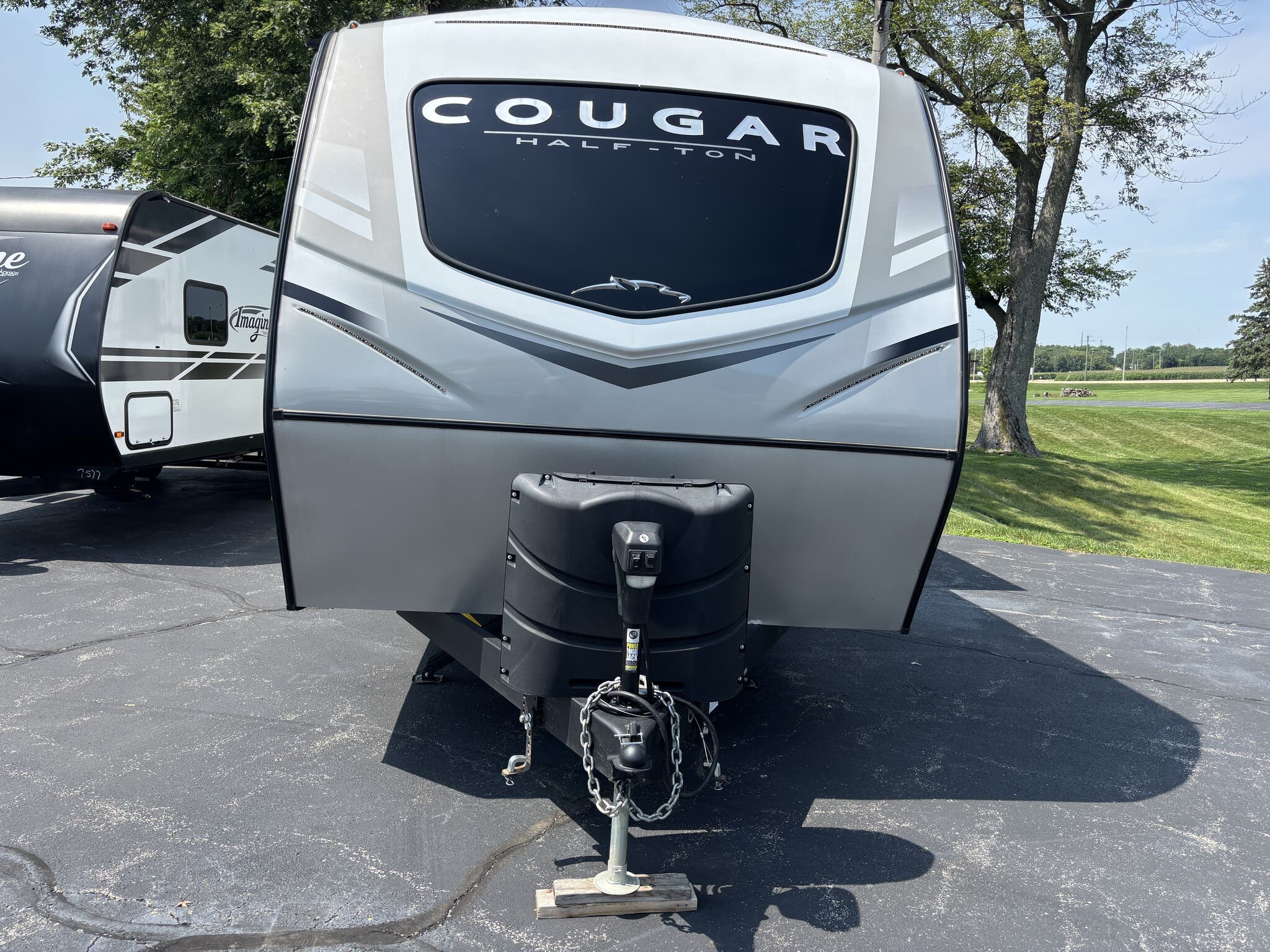Call now about this 2023 Keystone Cougar Half-Ton 25RDSWE! 2023 Keystone Cougar Half-Ton 25RDSWE - Used Travel Trailer For Sale by Winnebago Motor Homes in Rockford, Illinois features Stove Top Burner, Exterior Speakers, Toilet, Smoke Detector, Ladder