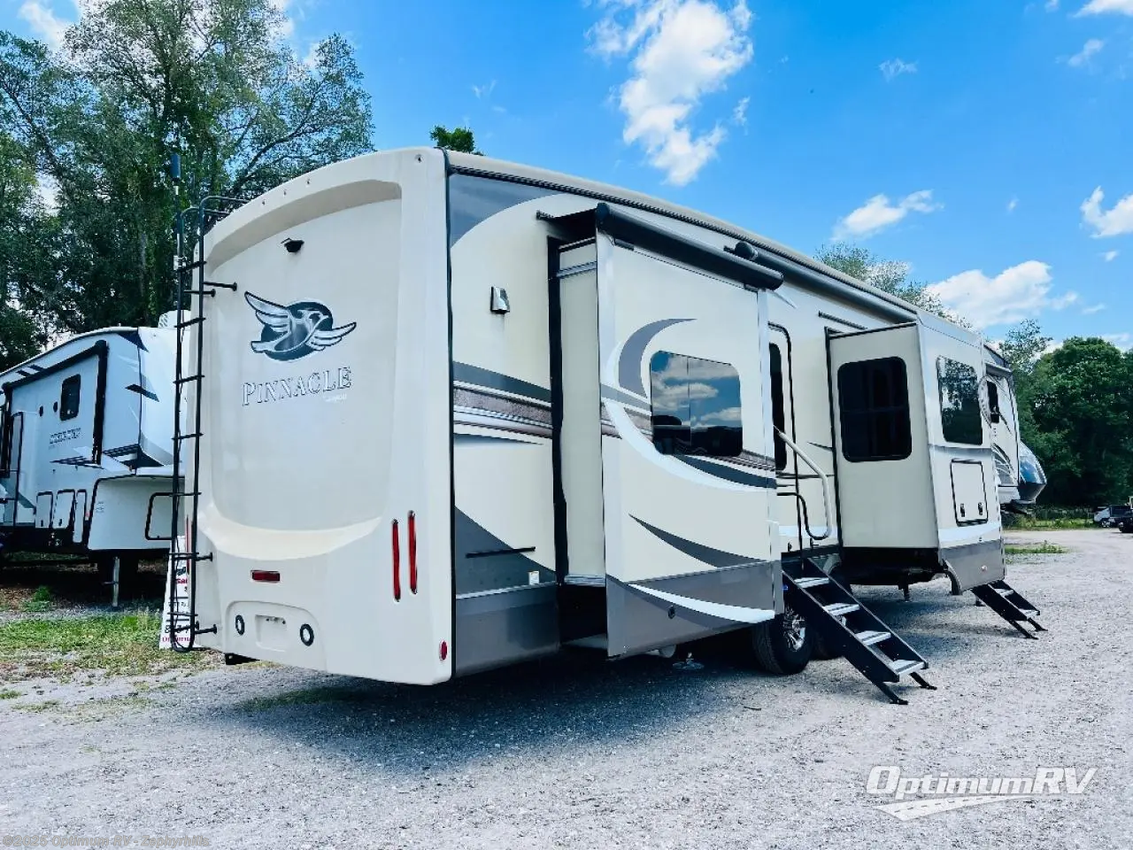 Call now about this 2018 Jayco Pinnacle 38FLWS! 2018 Jayco Pinnacle 38FLWS - Used Fifth Wheel For Sale by Optimum RV - Zephyrhills in Zephyrhills, Florida features Slideout, Awning