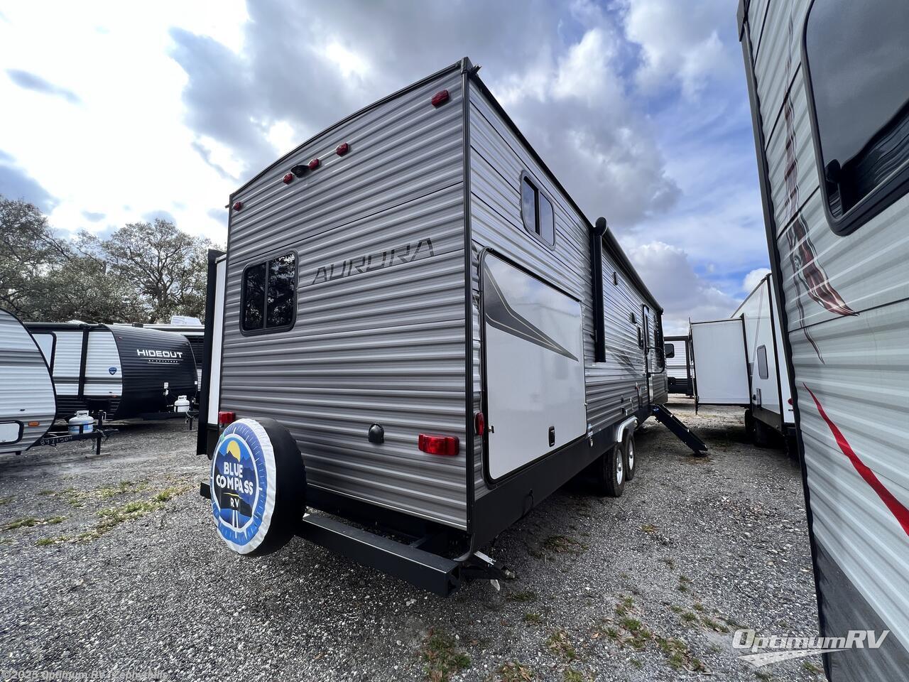 Call now about this 2023 Forest River Aurora 34BHTS! 2023 Forest River Aurora 34BHTS - Used Travel Trailer For Sale by Optimum RV - Zephyrhills in Zephyrhills, Florida features Awning, Slideout