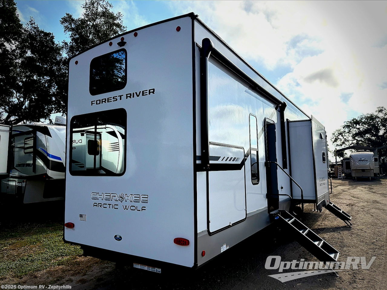 Call now about this 2025 Forest River Cherokee Arctic Wolf Suite 3750SUITE! 2025 Forest River Cherokee Arctic Wolf Suite 3750SUITE - New Fifth Wheel For Sale by Optimum RV - Zephyrhills in Zephyrhills, Florida features Slideout, Awning