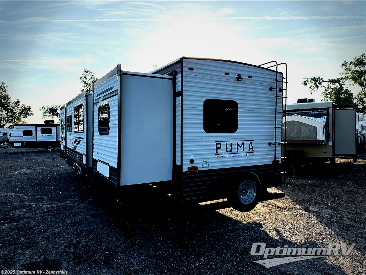 Call now about this 2023 Palomino Puma 32RBFQ! 2023 Palomino Puma 32RBFQ - Used Travel Trailer For Sale by Optimum RV - Zephyrhills in Zephyrhills, Florida features Awning, Slideout