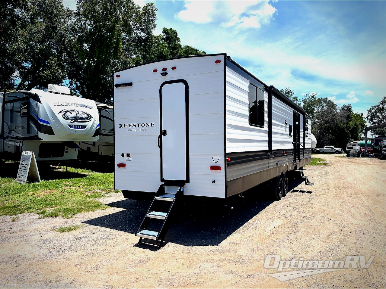 Call now about this 2026 Keystone Hideout 38DBD! 2026 Keystone Hideout 38DBD - New Destination Trailer For Sale by Optimum RV - Zephyrhills in Zephyrhills, Florida