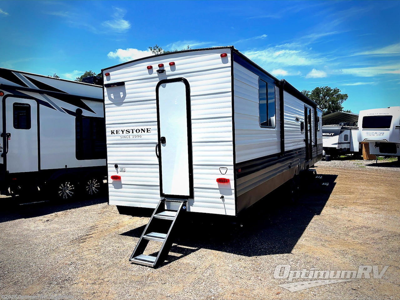 Call now about this 2026 Keystone Hideout 38DBD! 2026 Keystone Hideout 38DBD - New Destination Trailer For Sale by Optimum RV - Zephyrhills in Zephyrhills, Florida