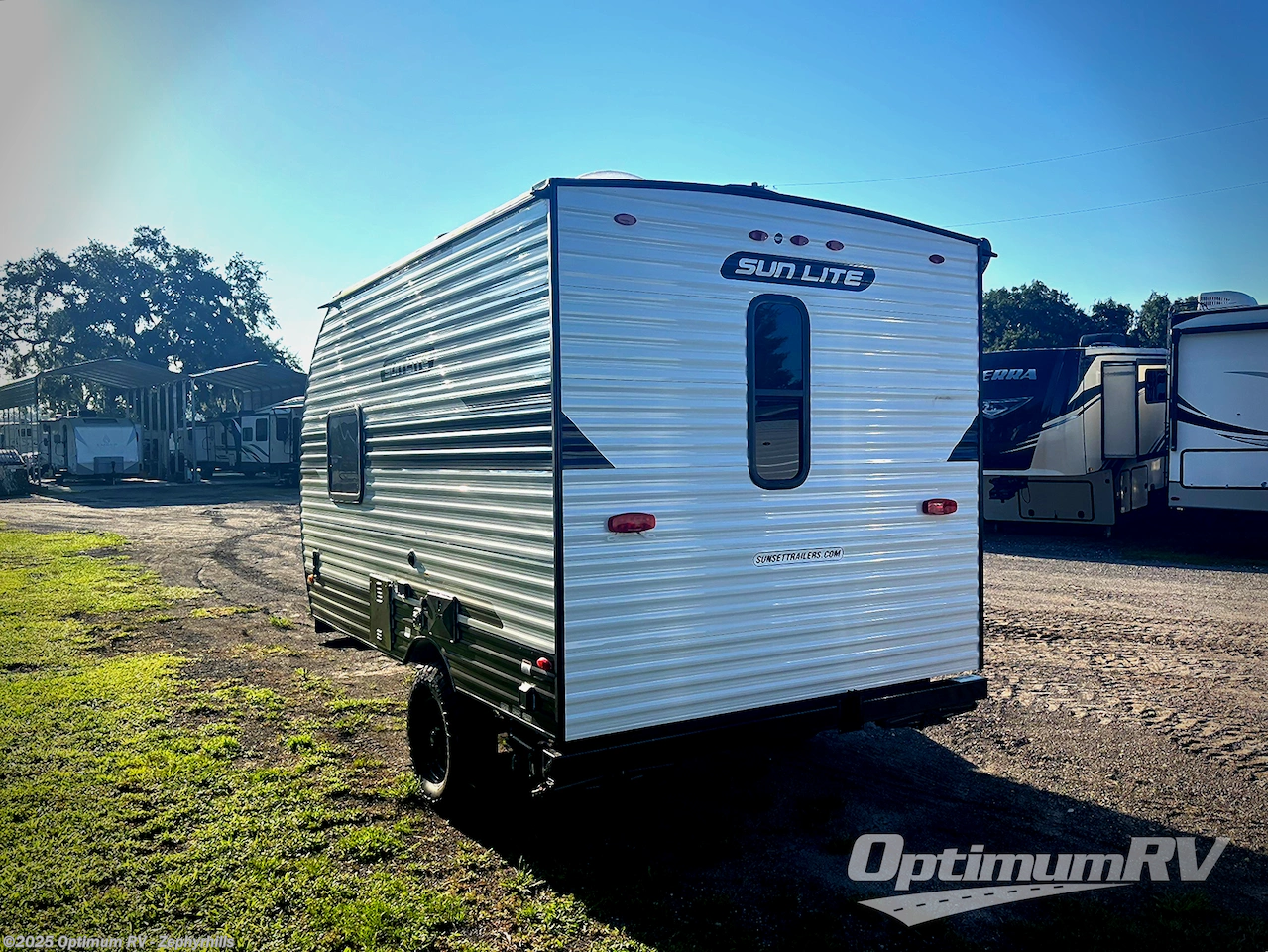Contact us now about this 2026 Sunset Park RV Sun Lite 14RB! 2026 Sun Lite 14RB by Sunset Park RV from Optimum RV - Zephyrhills in Zephyrhills, Florida
