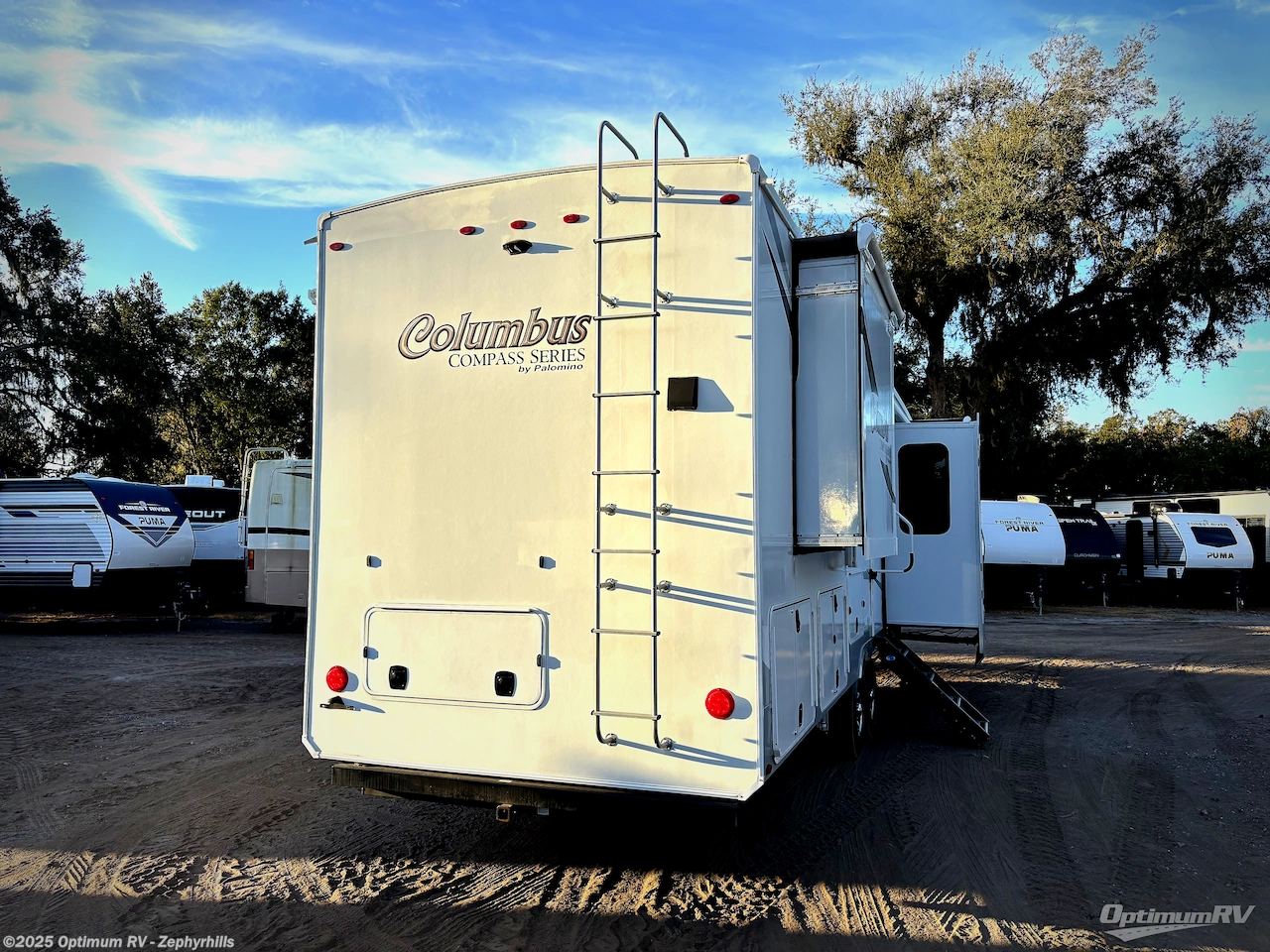 Call now about this 2021 Palomino Columbus 389FLC! 2021 Palomino Columbus 389FLC - Used Fifth Wheel For Sale by Optimum RV - Zephyrhills in Zephyrhills, Florida features Awning, Slideout