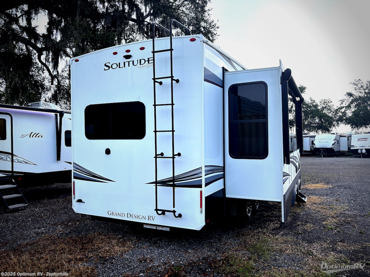 Call now about this 2022 Grand Design Solitude 280RK! 2022 Grand Design Solitude 280RK - Used Fifth Wheel For Sale by Optimum RV - Zephyrhills in Zephyrhills, Florida features Slideout, Awning