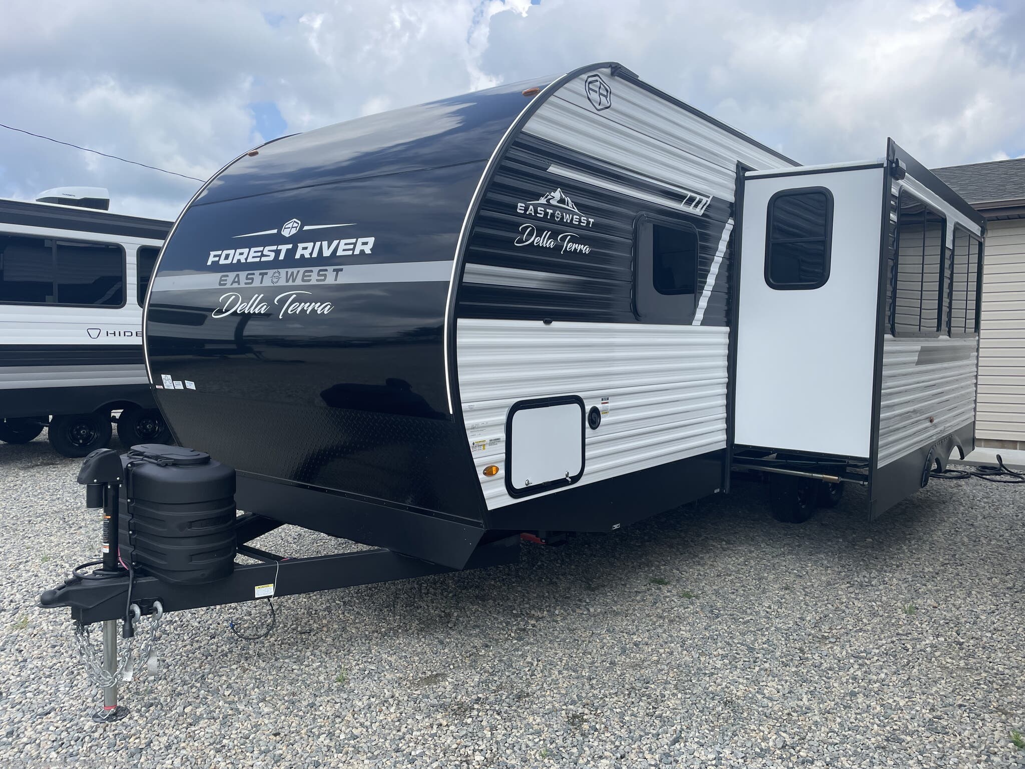 Call now about this 2026 East to West Della Terra 261RB! 2026 East to West Della Terra 261RB - New Travel Trailer For Sale by Alexander RV & Trailer Center in Clayton, Delaware features Aluminum Entrance Steps, Fire Extinguisher, Refrigerator (12V), Auxiliary Battery, Pass Thru Storage
