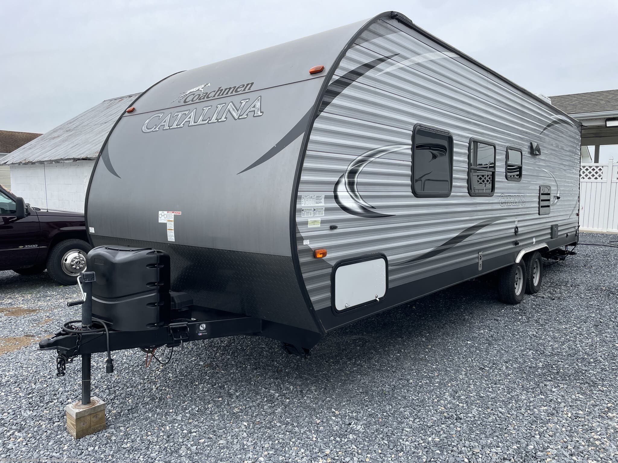 Call now about this 2017 Coachmen Catalina 273BH! 2017 Coachmen Catalina 273BH - Used Travel Trailer For Sale by Alexander RV & Trailer Center in Clayton, Delaware features Stabilizer Jacks, LP Detector, Manual Awning, Fire Extinguisher, CO Detector
