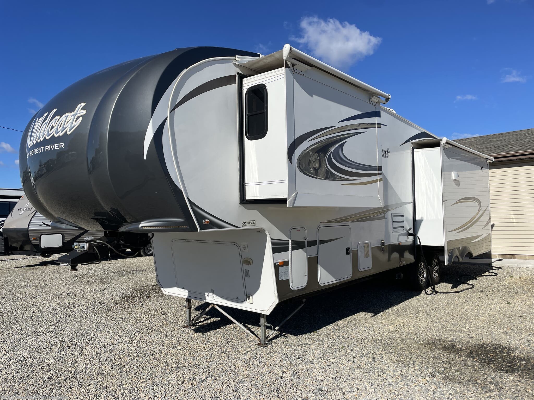 Call now about this 2015 Forest River Wildcat 333MK! 2015 Forest River Wildcat 333MK - Used Fifth Wheel For Sale by Alexander RV & Trailer Center in Clayton, Delaware features Oven, Self Contained, Backup Camera, 50 Amp Service, Slam Latch Baggage Doors