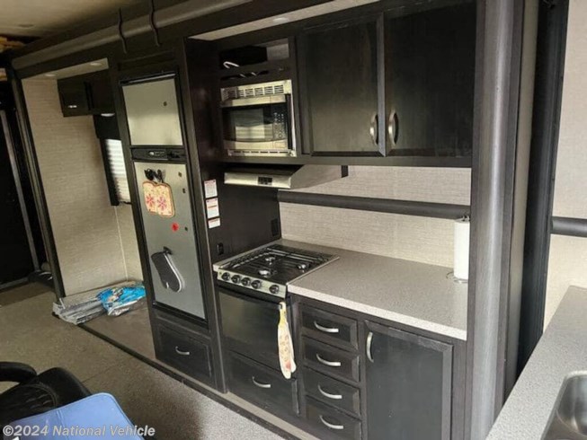 2017 Voltage Triton Toy Hauler 3351 by Dutchmen from National Vehicle in Woodville, Texas