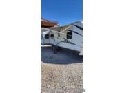 Call now about this 2012 Keystone Outback 10th Anniversary 298RE! 2012 Keystone Outback 10th Anniversary 298RE - Used Travel Trailer For Sale by National Vehicle in Manning, Iowa