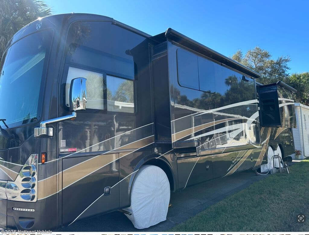 Call now about this 2015 Thor Motor Coach Tuscany 42HQ! 2015 Thor Motor Coach Tuscany 42HQ - Used Class A For Sale by National Vehicle in Titusville, Florida