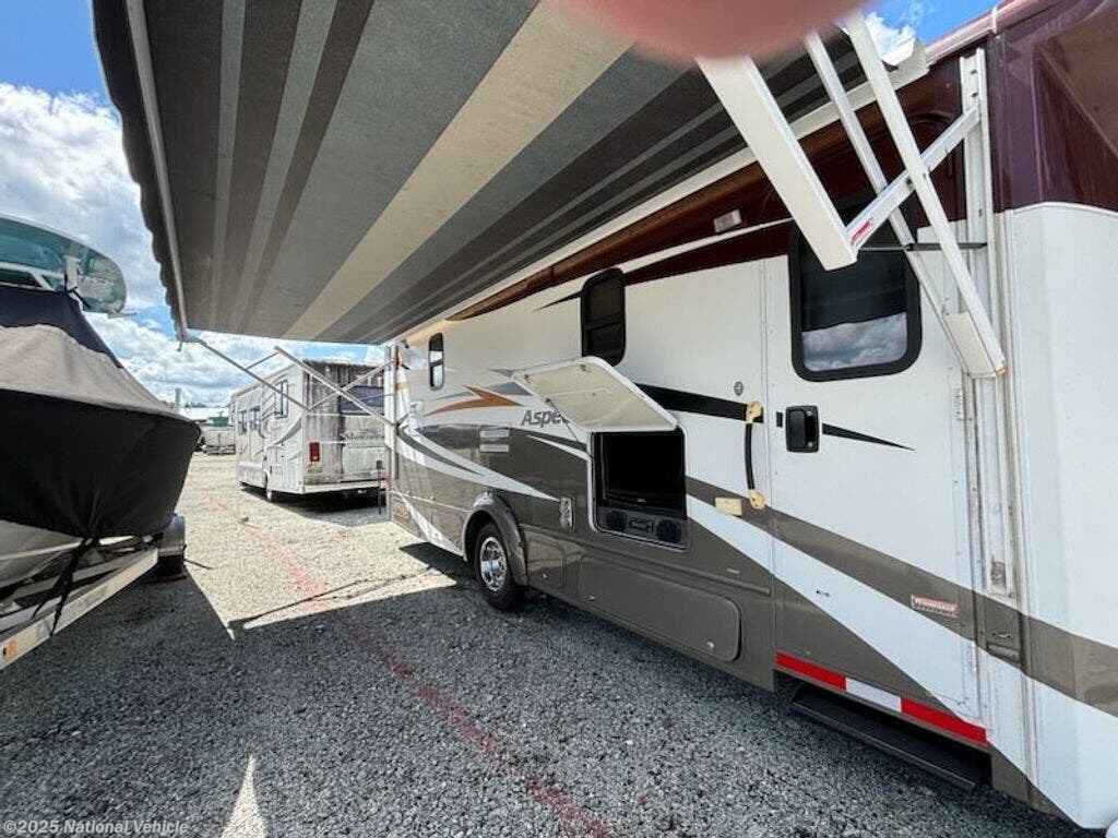 Call now about this 2012 Winnebago Aspect 28T! 2012 Winnebago Aspect 28T - Used Class C For Sale by National Vehicle in Titusville, Florida