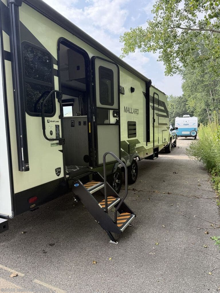 Call now about this 2021 Heartland Mallard 27! 2021 Heartland Mallard 27 - Used Travel Trailer For Sale by National Vehicle in Rochester, Minnesota