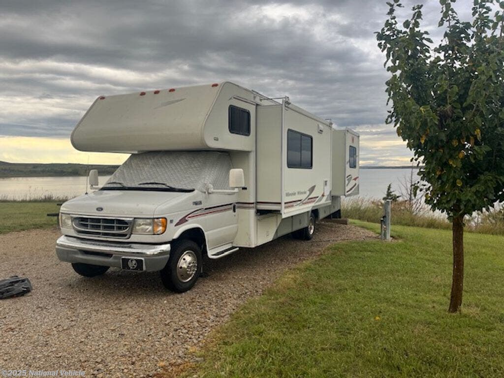 Call now about this 2002 Winnebago Minnie Winnie 30V! 2002 Winnebago Minnie Winnie 30V - Used Class C For Sale by National Vehicle in Russell, Kansas