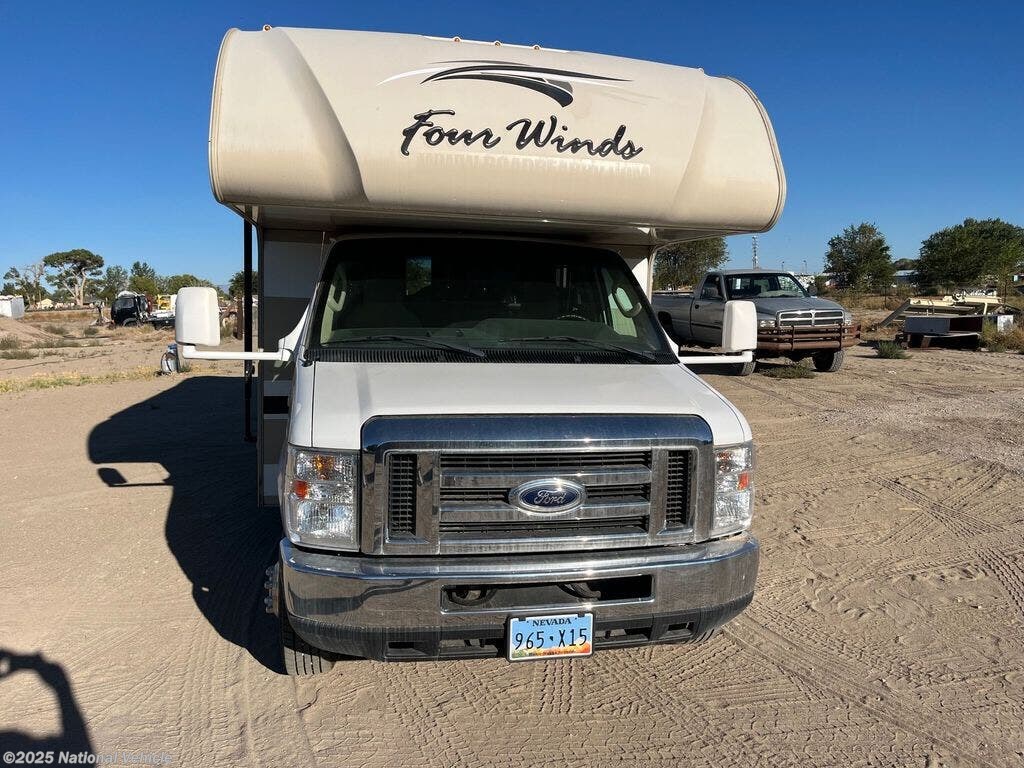 Call now about this 2019 Thor Motor Coach Four Winds 26B! 2019 Thor Motor Coach Four Winds 26B - Used Class C For Sale by National Vehicle in Fallon, Nevada