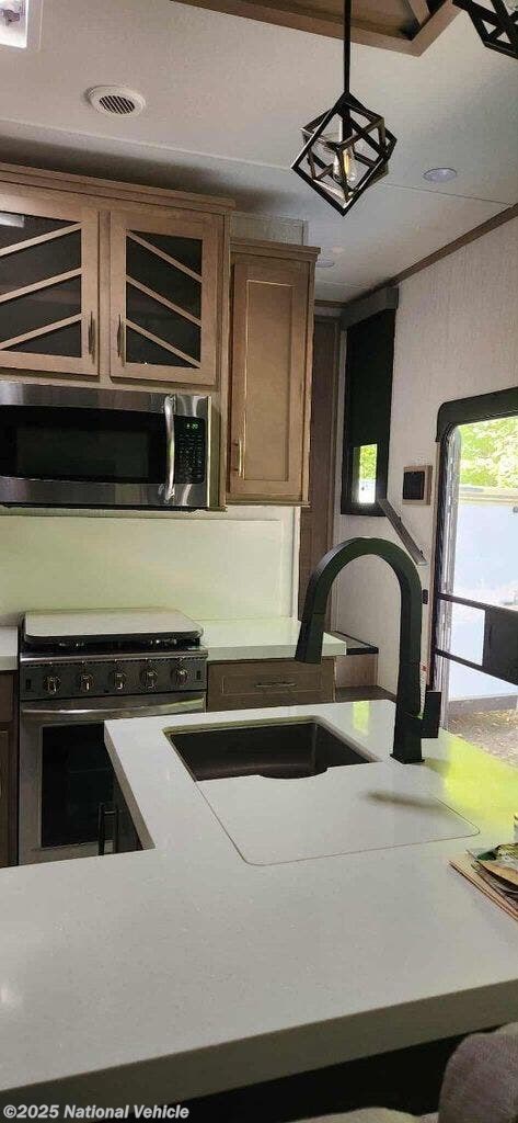 Contact us now about this 2023 Grand Design Momentum M-Class 395MS-R! 2023 Momentum M-Class 395MS-R by Grand Design from National Vehicle in Harrison, Maine