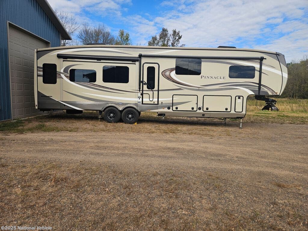 Call now about this 2018 Jayco Pinnacle 37MDQS! 2018 Jayco Pinnacle 37MDQS - Used Fifth Wheel For Sale by National Vehicle in Isanti, Minnesota