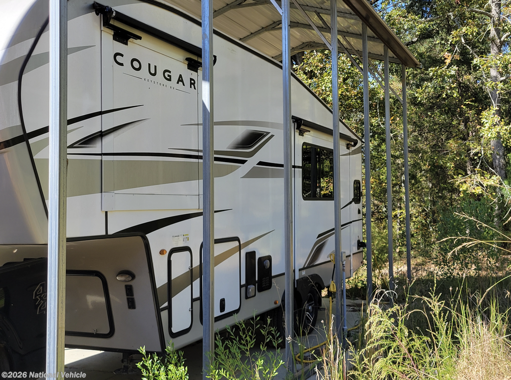 Call now about this 2023 Keystone Cougar 23MLE! 2023 Keystone Cougar 23MLE - Used Fifth Wheel For Sale by National Vehicle in Cross Hill, South Carolina