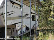 Call now about this 2023 Keystone Cougar 23MLE! 2023 Keystone Cougar 23MLE - Used Fifth Wheel For Sale by National Vehicle in Cross Hill, South Carolina
