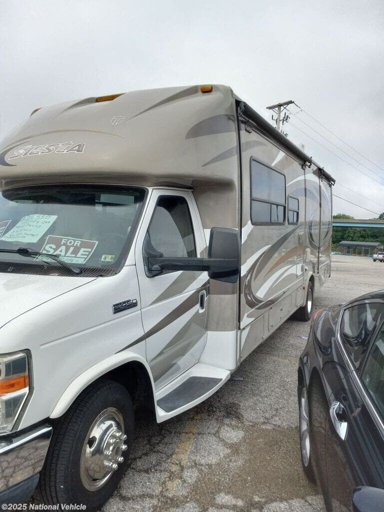 Contact us now about this 2014 Thor Motor Coach Four Winds Siesta 29TB! 2014 Four Winds Siesta 29TB by Thor Motor Coach from National Vehicle in Proctorville, Ohio