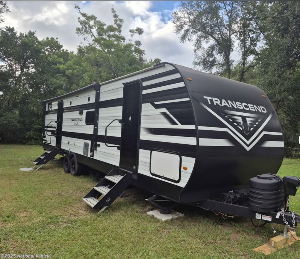 Call now about this 2024 Grand Design Transcend Xplor 321BH! 2024 Grand Design Transcend Xplor 321BH - Used Travel Trailer For Sale by National Vehicle in Lakeland, Florida
