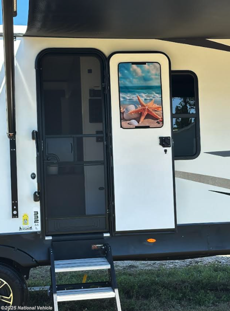 Contact us now about this 2022 Keystone Outback 332ML! 2022 Outback 332ML by Keystone from National Vehicle in Santa Rosa Beach, Florida